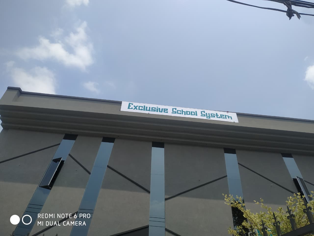 Exclusive School System modern campus building